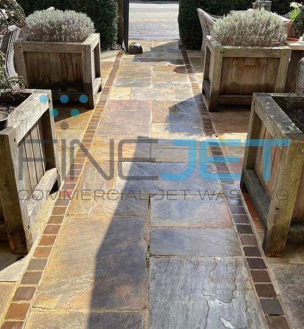 Stone patio area cleaned at popular pub in Kingham, Oxfordshire