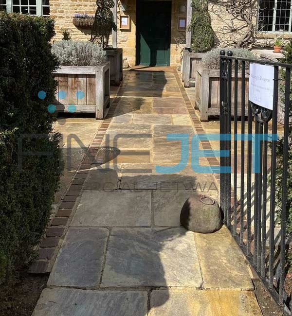 Stone patio area cleaned at popular pub in Kingham, Oxfordshire