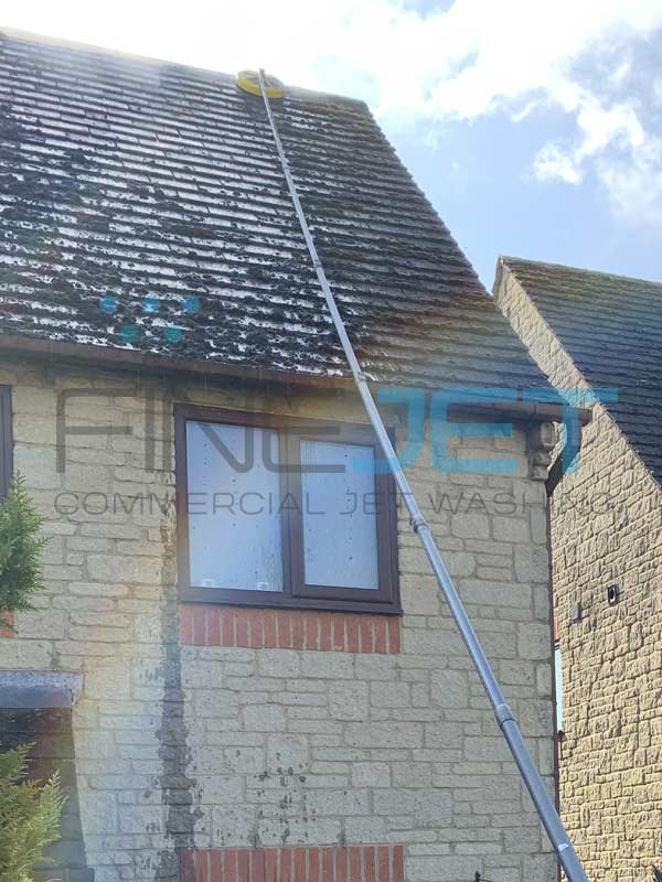 Professional moss removal and roof cleaning for detached property in Oxford, Oxfordshire